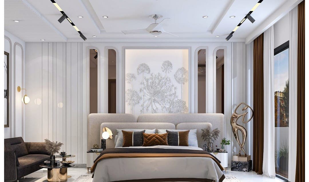 White luxury bedroom with layered false ceiling, cove lighting and track lights in Bikaner