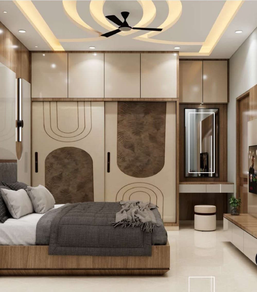 Spiral cove false ceiling design with warm lighting in a bedroom interior, Bikaner